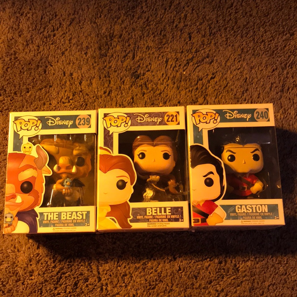Belle, the beast, and Gaston Pops